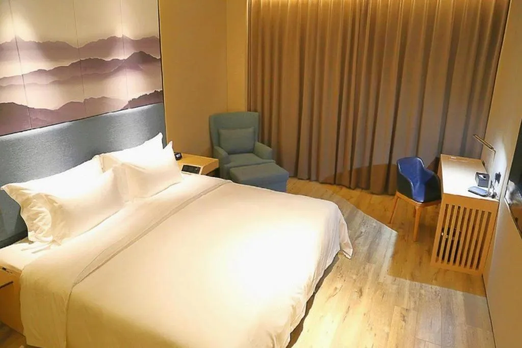 Bed in Qingdao Elegance Hotel