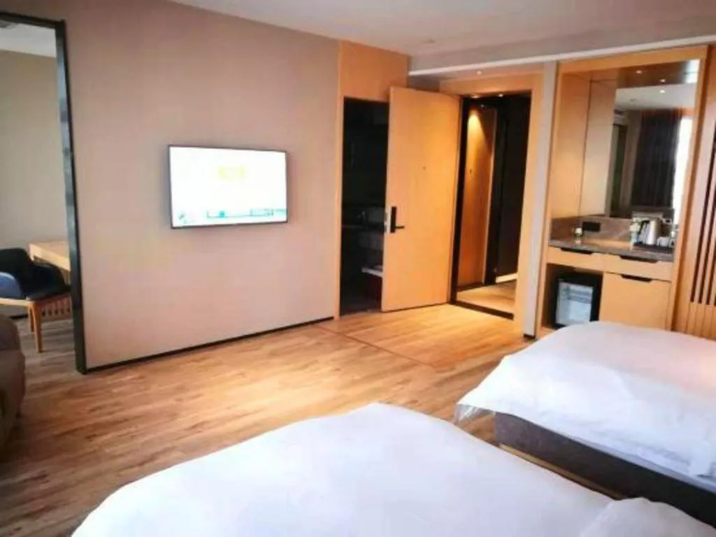 Bed in Qingdao Elegance Hotel