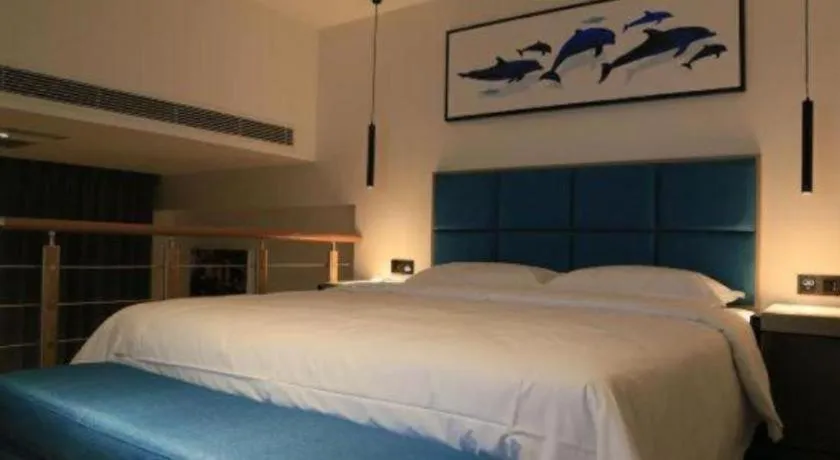 Bed in Qingdao Elegance Hotel