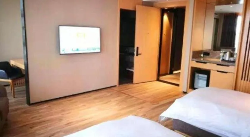 Bed in Qingdao Elegance Hotel