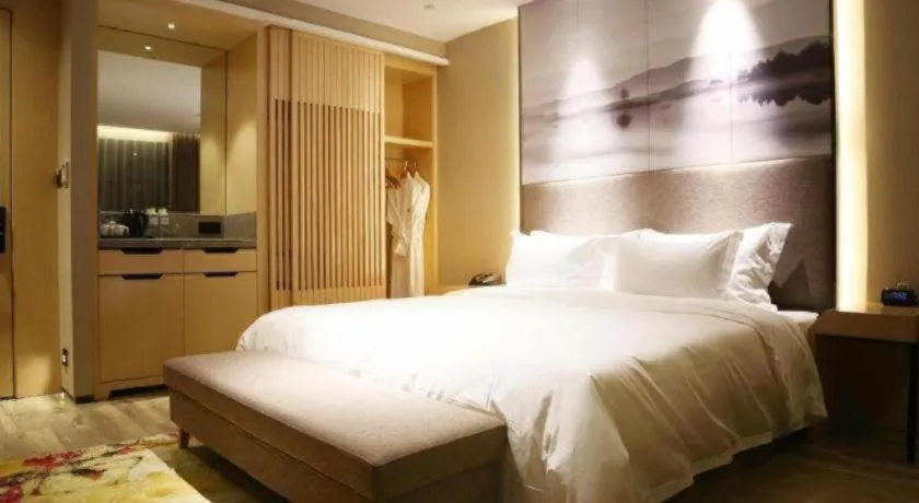 Bed in Qingdao Elegance Hotel