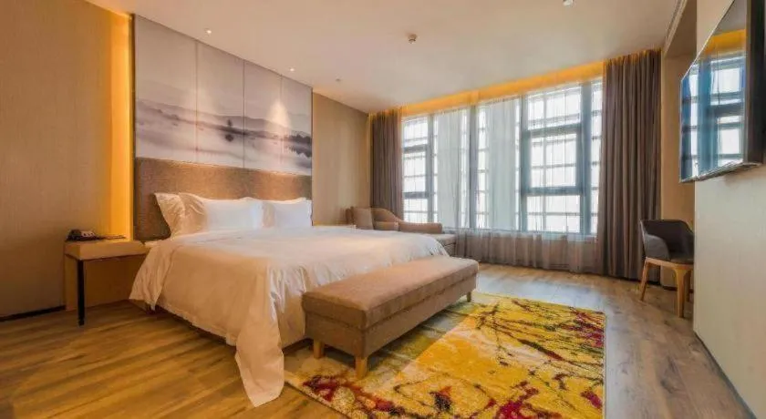 Bed in Qingdao Elegance Hotel