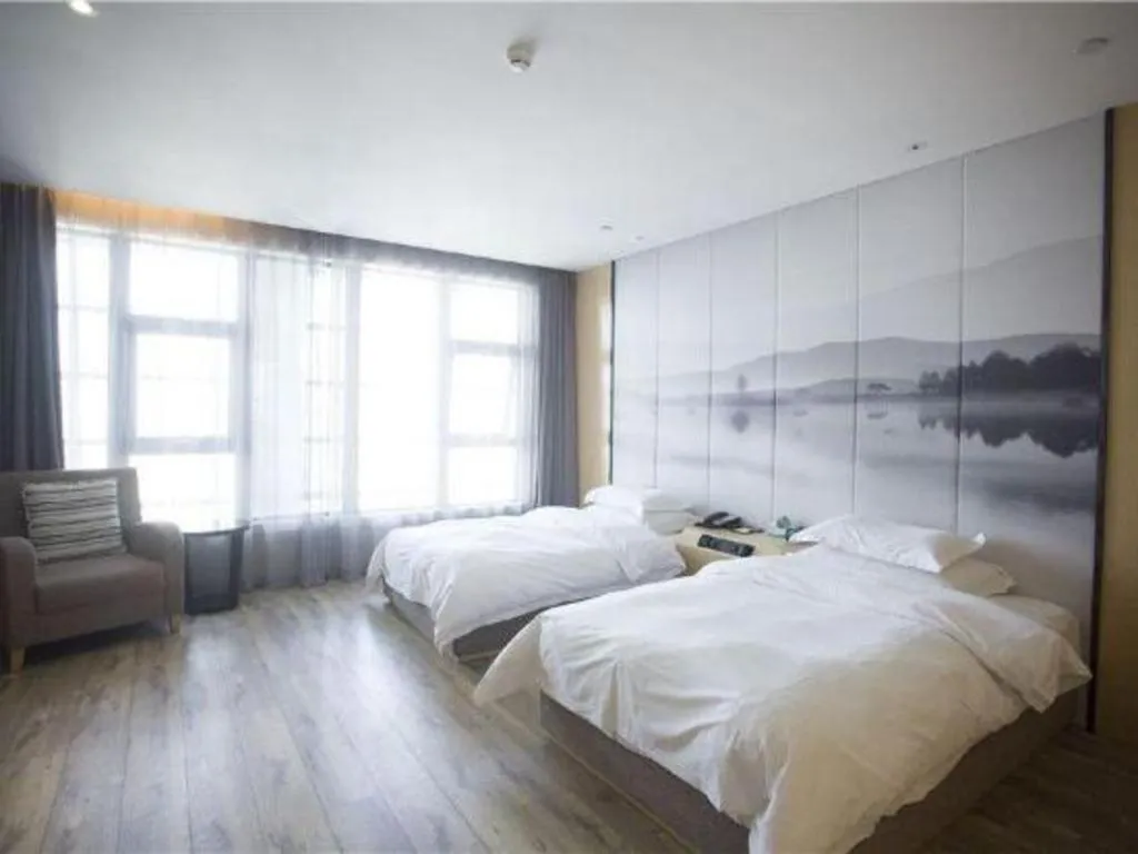 Bed in Qingdao Elegance Hotel