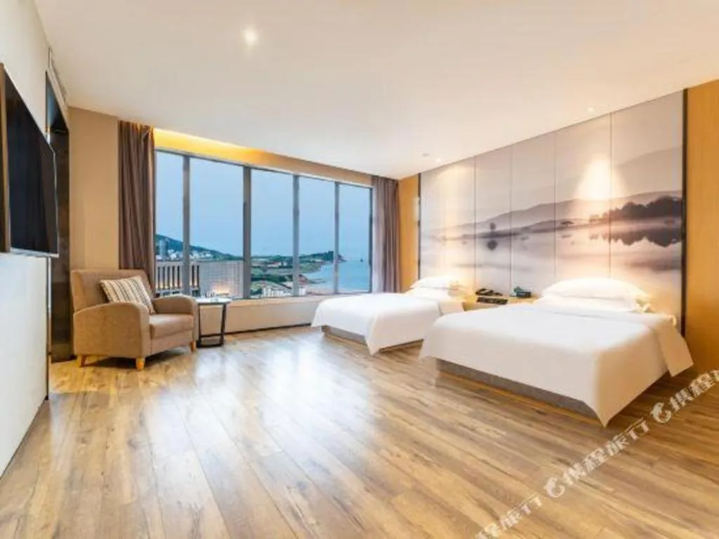 Bed in Qingdao Elegance Hotel