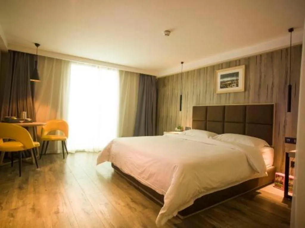 Bed in Qingdao Elegance Hotel