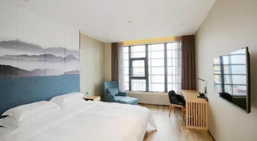 Bed in Qingdao Elegance Hotel