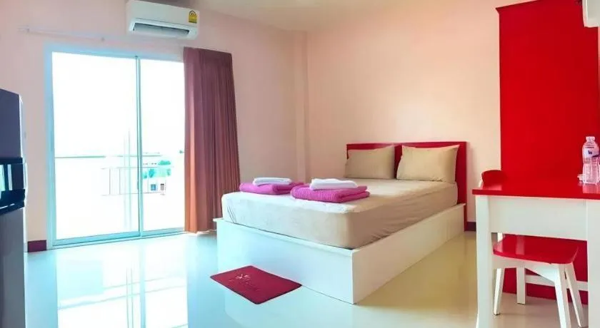 Bed in V-House Hotel