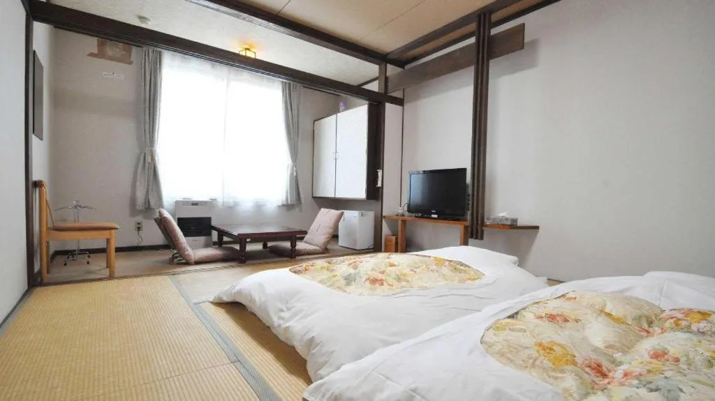 Bed in Yunosawa Onsen Mori no Shiki