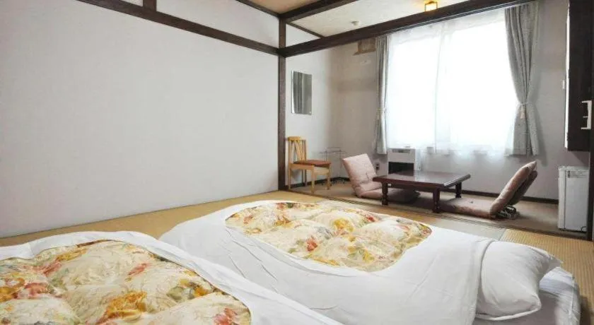 Bed in Yunosawa Onsen Mori no Shiki