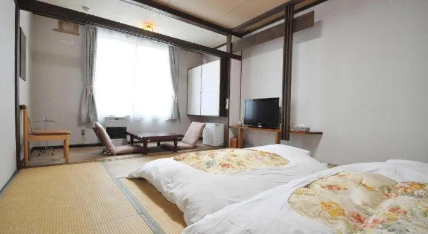 Bed in Yunosawa Onsen Mori no Shiki