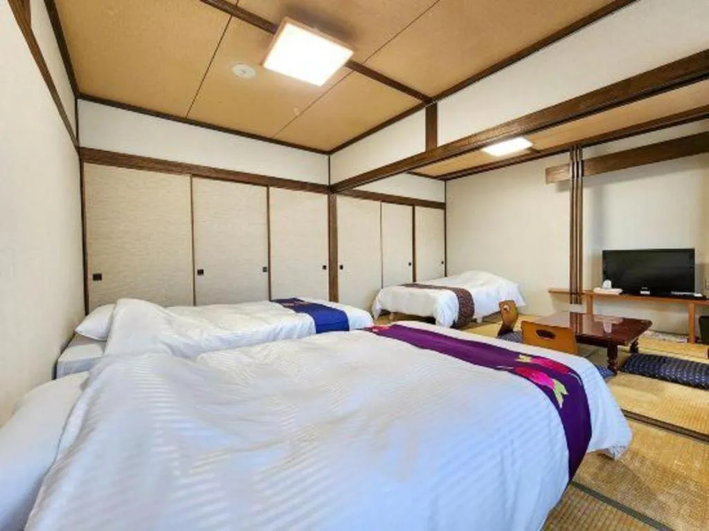 Bed in Yunosawa Onsen Mori no Shiki