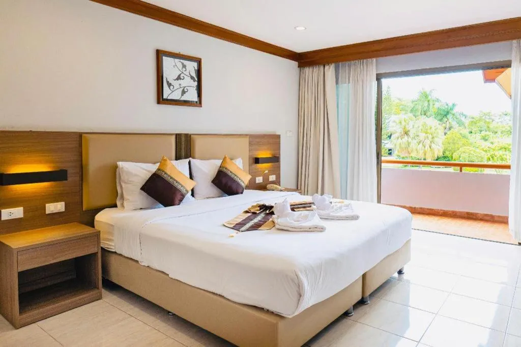 Bed in The Impress Nan Hotel