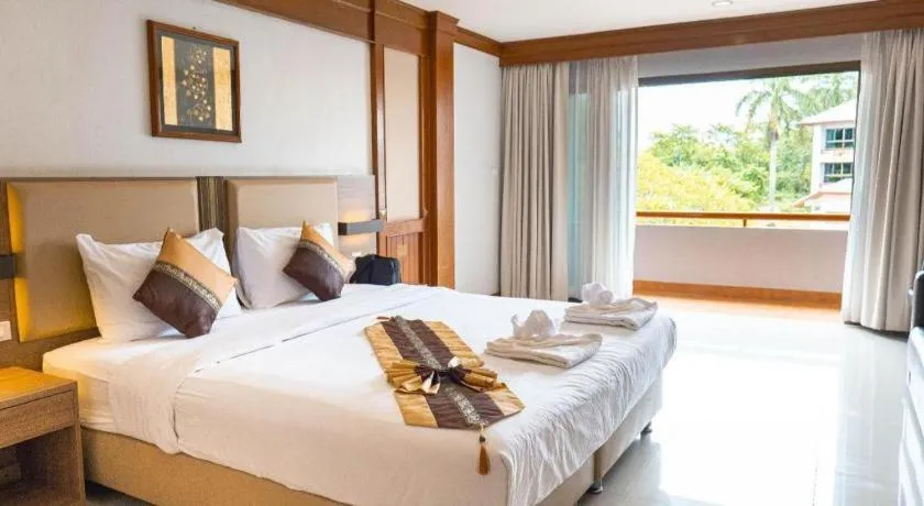 Bed in The Impress Nan Hotel