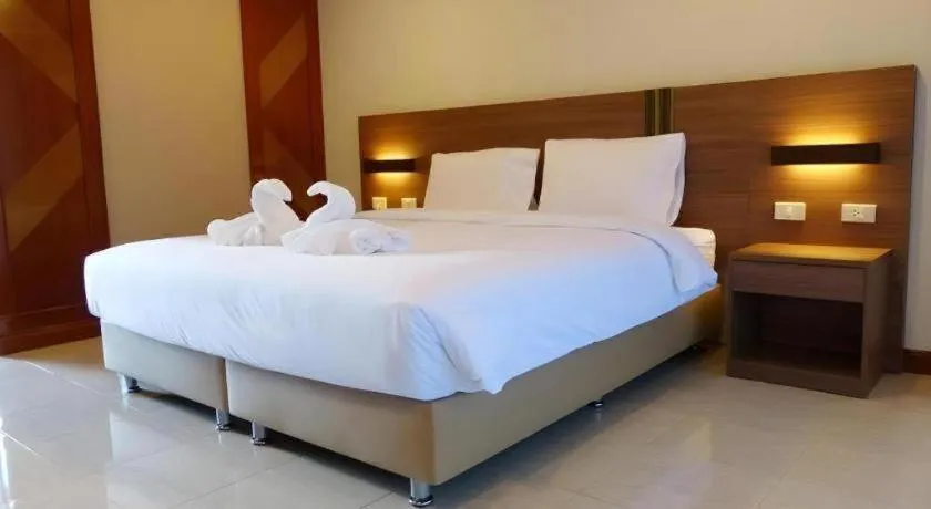 Bed in The Impress Nan Hotel