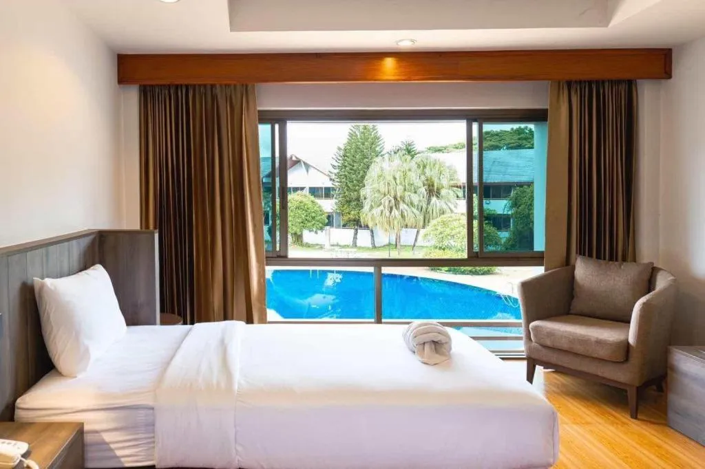 Bed in The Impress Nan Hotel