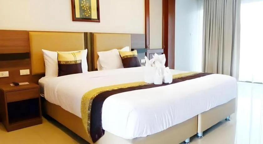 Bed in The Impress Nan Hotel