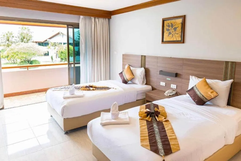 Bed in The Impress Nan Hotel