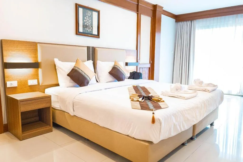 Bed in The Impress Nan Hotel