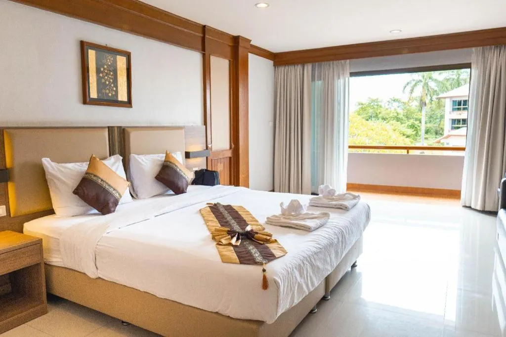 Bed in The Impress Nan Hotel