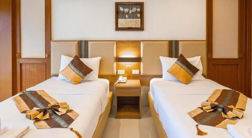 Bed in The Impress Nan Hotel