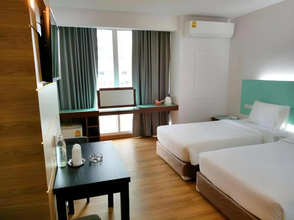 Bed in Mayflower Grande Hotel