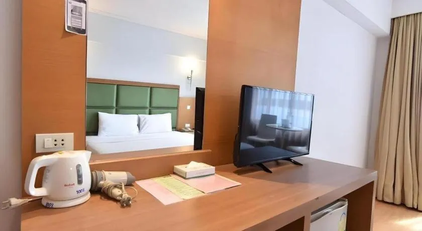 Bed in Mayflower Grande Hotel