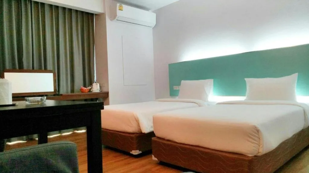 Bed in Mayflower Grande Hotel