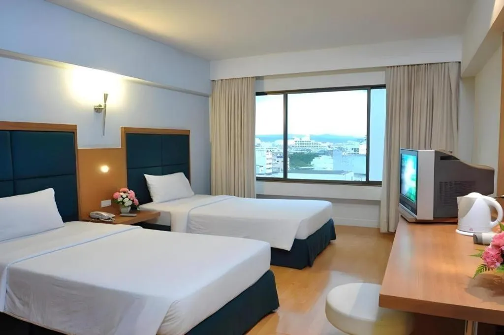 Bed in Mayflower Grande Hotel