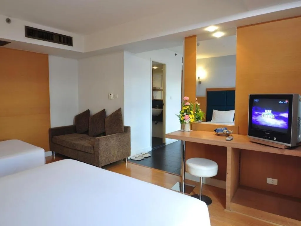 Bed in Mayflower Grande Hotel