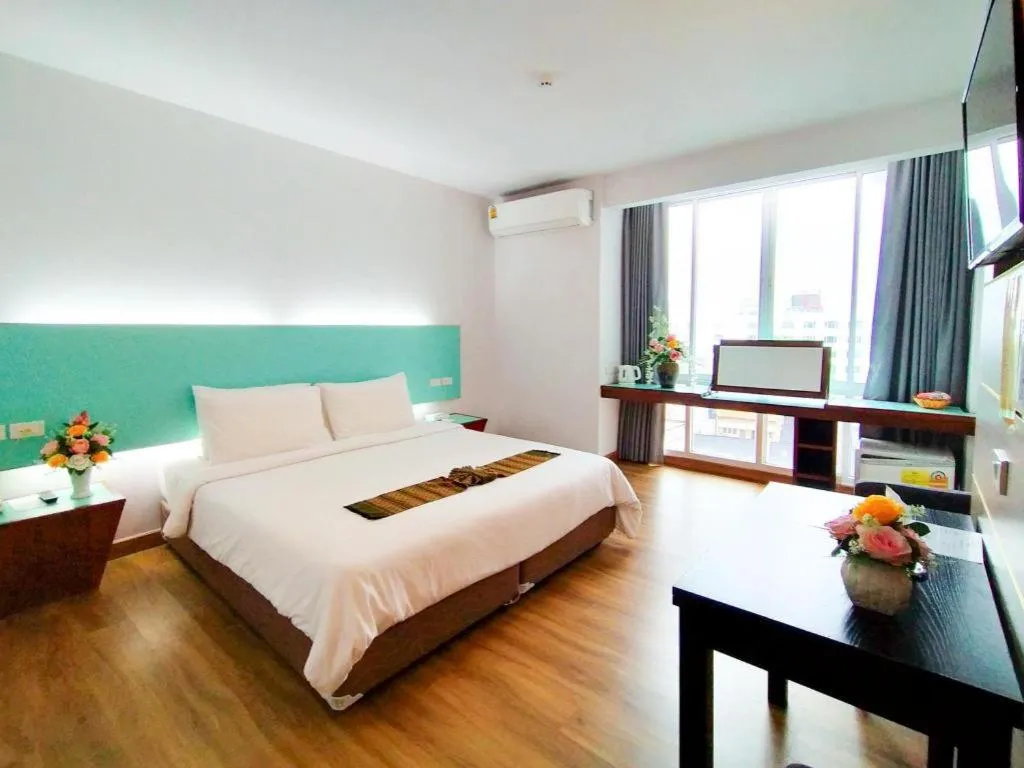 Bed in Mayflower Grande Hotel