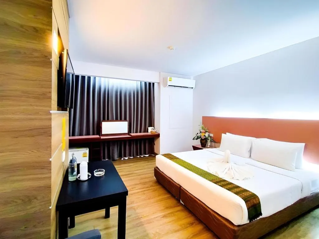 Bed in Mayflower Grande Hotel