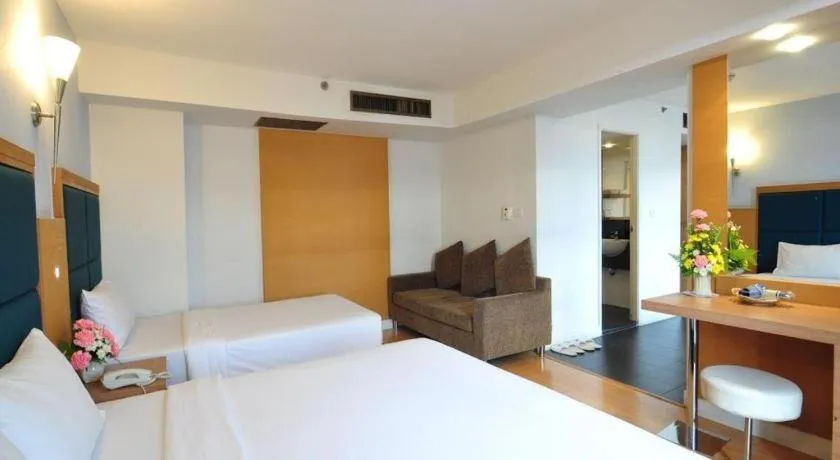 Bed in Mayflower Grande Hotel