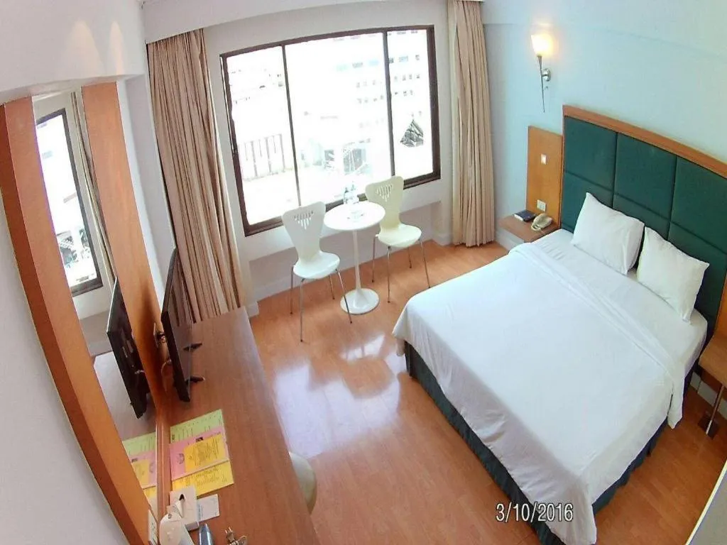 Bed in Mayflower Grande Hotel