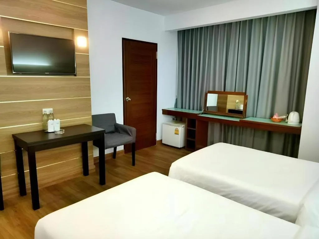 Bed in Mayflower Grande Hotel