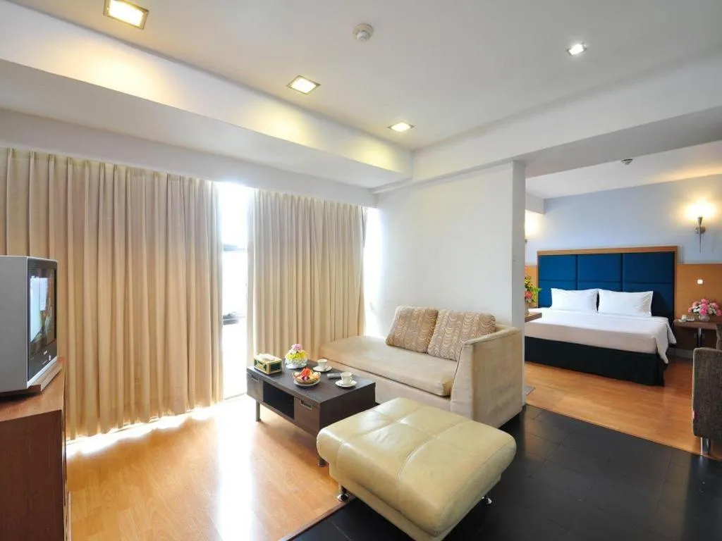 Bed in Mayflower Grande Hotel