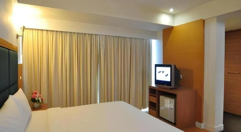 Bed in Mayflower Grande Hotel