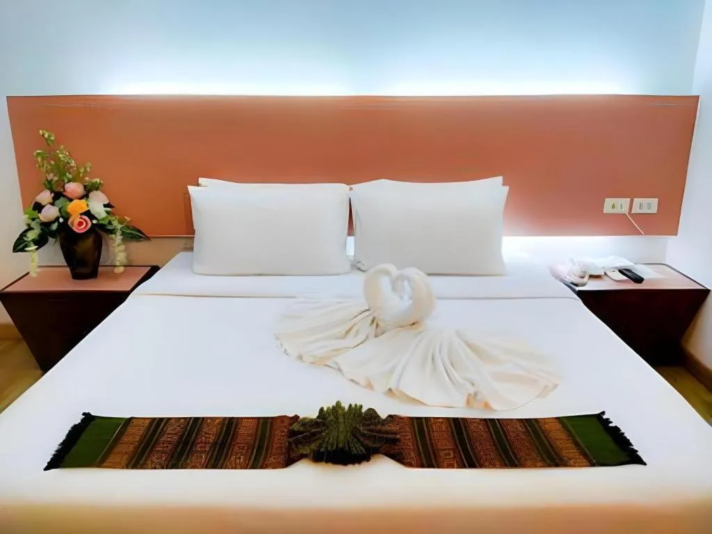 Bed in Mayflower Grande Hotel