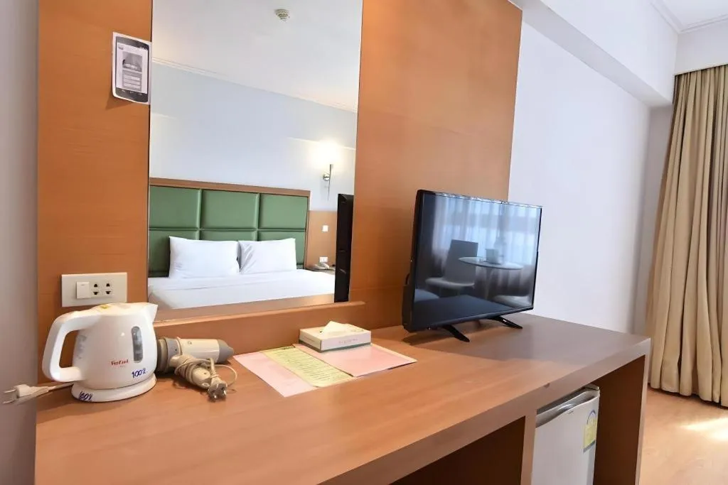 Bed in Mayflower Grande Hotel