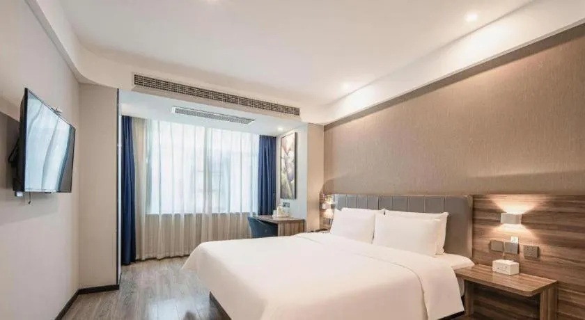 Bed in 7 Days Inn Yingshang Lanxing Building Materials Market