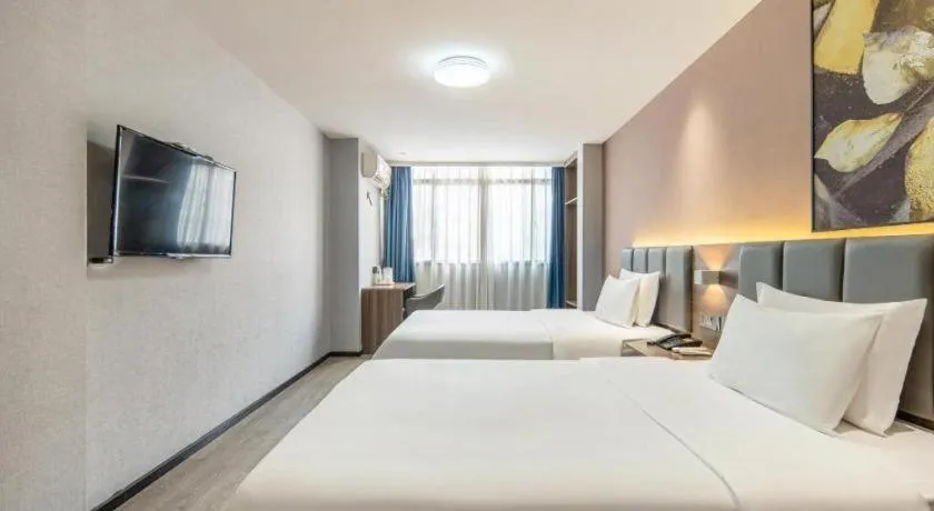 Bed in 7 Days Inn Yingshang Lanxing Building Materials Market