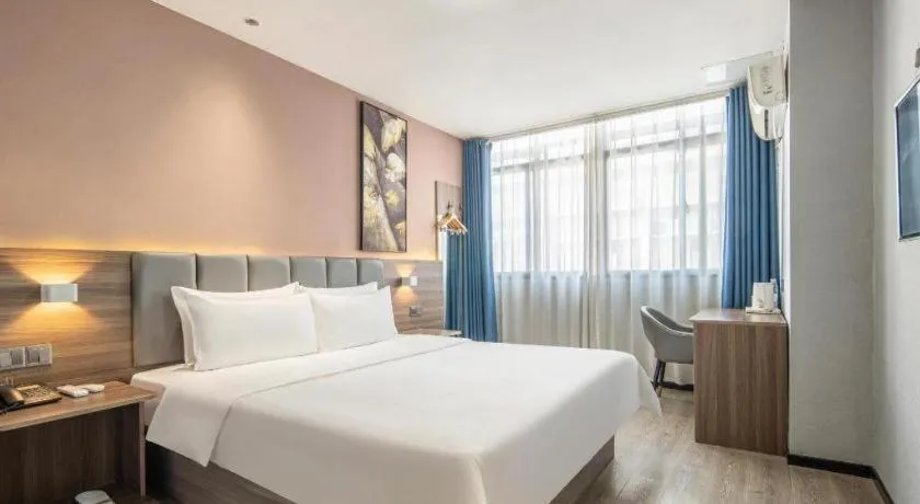 Bed in 7 Days Inn Yingshang Lanxing Building Materials Market