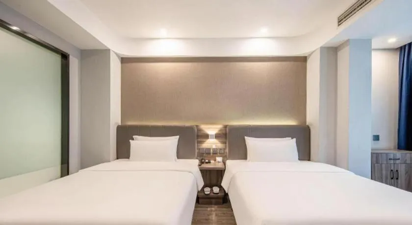 Bed in 7 Days Inn Yingshang Lanxing Building Materials Market