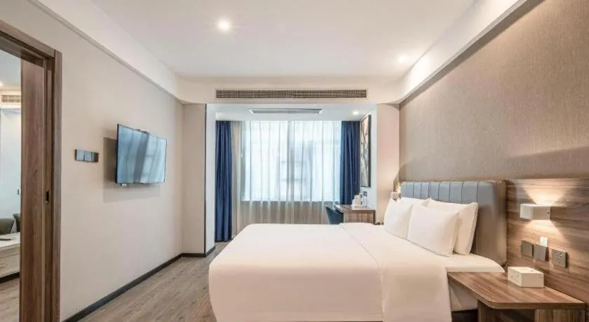 Bed in 7 Days Inn Yingshang Lanxing Building Materials Market