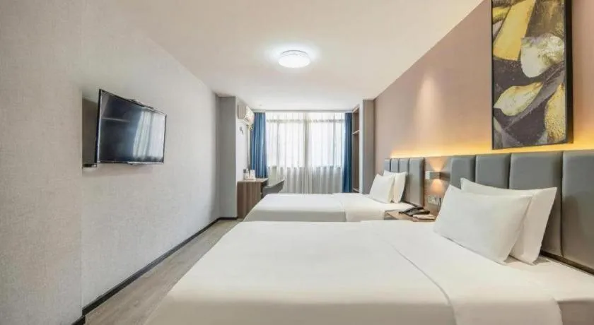 Bed in 7 Days Inn Yingshang Lanxing Building Materials Market