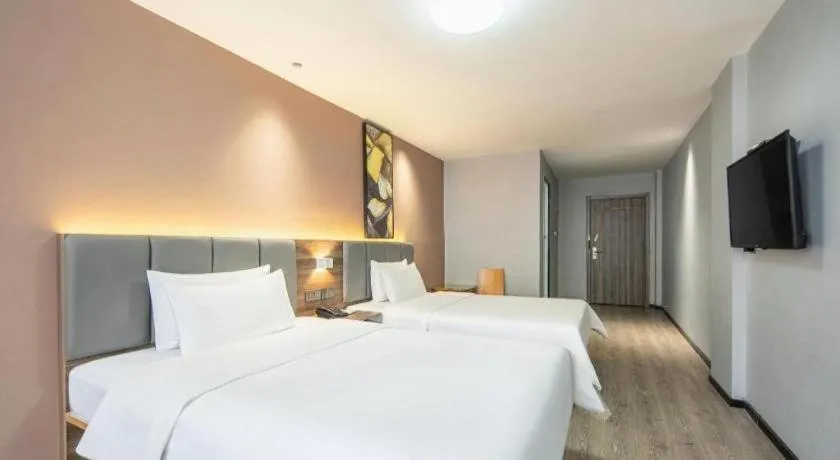 Bed in 7 Days Inn Yingshang Lanxing Building Materials Market