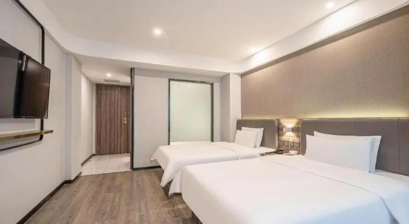 Bed in 7 Days Inn Yingshang Lanxing Building Materials Market