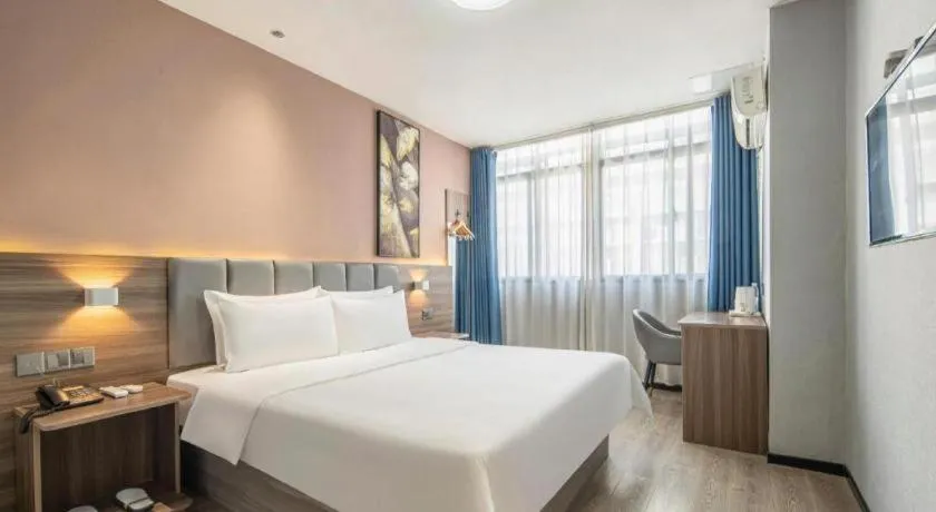 Bed in 7 Days Inn Yingshang Lanxing Building Materials Market