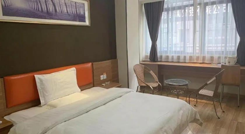 Bed in 7 Days Inn Yingshang Lanxing Building Materials Market