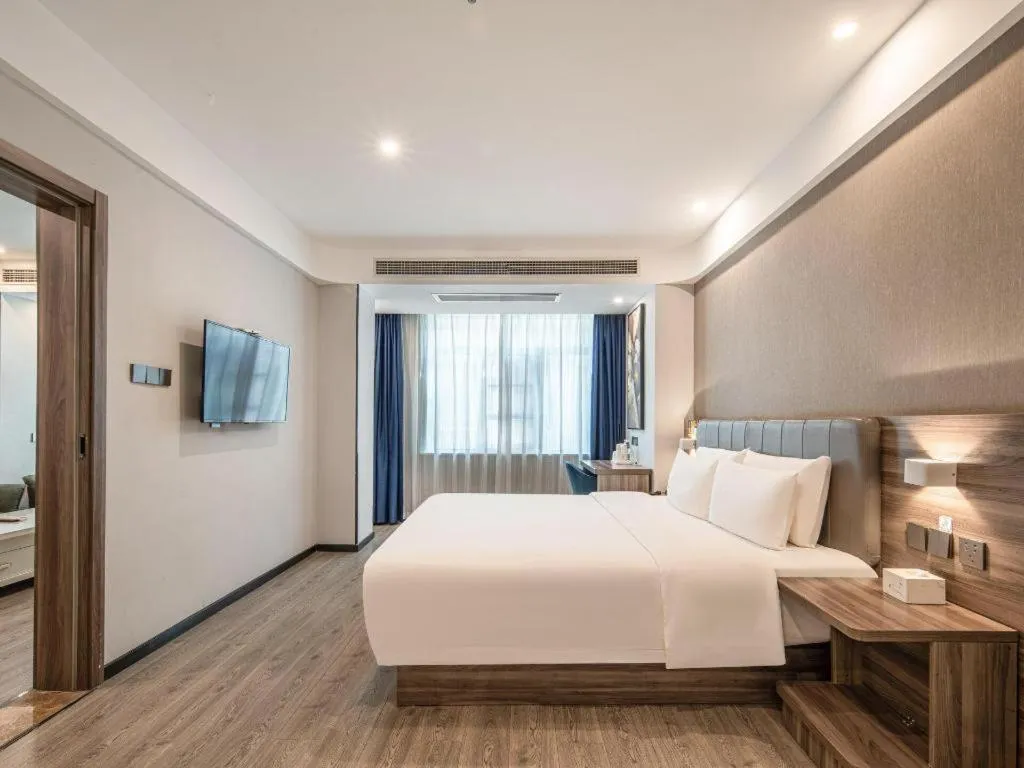 Bed in 7 Days Inn Yingshang Lanxing Building Materials Market