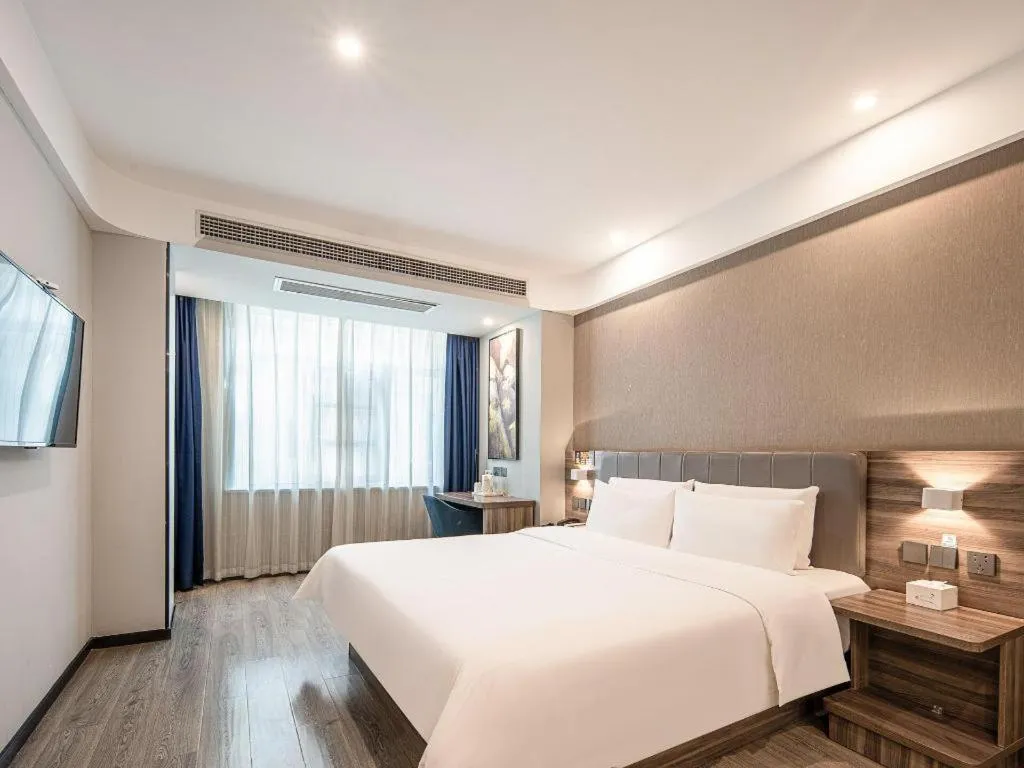 Bed in 7 Days Inn Yingshang Lanxing Building Materials Market